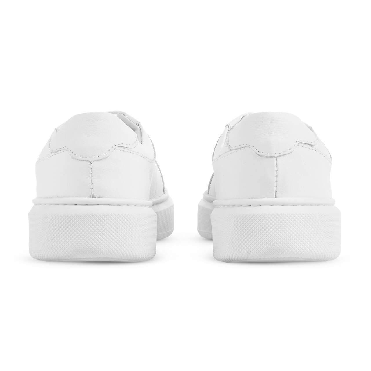 St. Barth Sheepskin Sneakers" can be rewritten as "Sheepskin Sneakers from St. Barth.