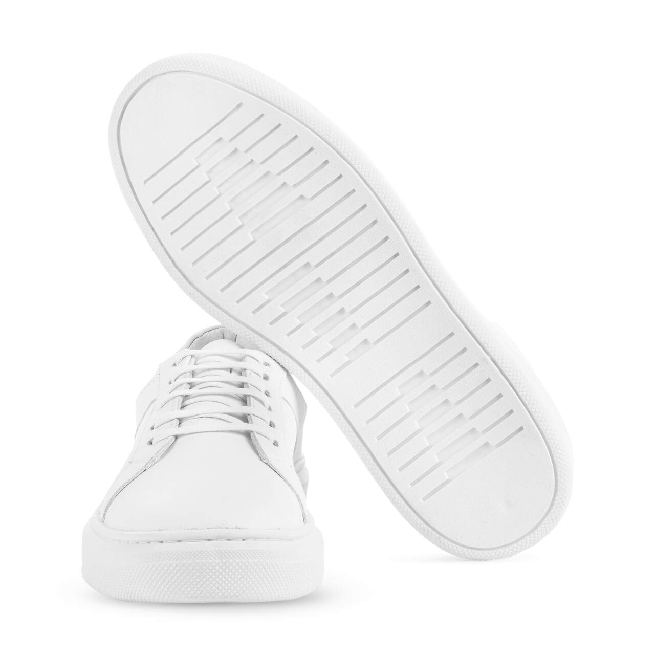 St. Barth Sheepskin Sneakers" can be rewritten as "Sheepskin Sneakers from St. Barth.